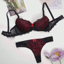 Conjunto de Brasier y tanga sexy y maduro para mujer en negro y rojo con copas push-up con aros, encaje y lazo
