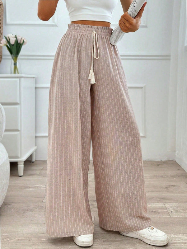 Pantalones boho anchos de vacaciones con bandas elasticas tejidas de rayas y cordon decorativo