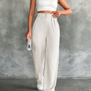 Pantalones altos de pierna ancha con pliegues