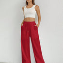 Pantalones sueltos de pierna ancha de color solido para mujer con dobladillo fluido, estilo casual