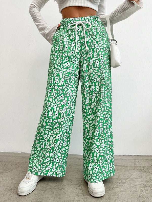 Pantalones largos con cintura con cordon y estampado floral