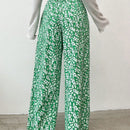 Pantalones largos con cintura con cordon y estampado floral