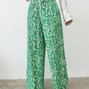 Pantalones largos con cintura con cordon y estampado floral