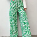 Pantalones largos con cintura con cordon y estampado floral