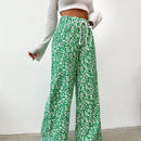 Pantalones largos con cintura con cordon y estampado floral