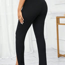 Lady Pantalones de textura femenina con dobladillo alto-bajo y raja