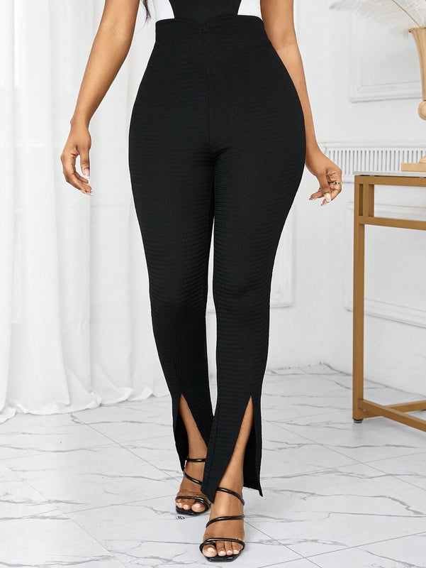 Lady Pantalones de textura femenina con dobladillo alto-bajo y raja