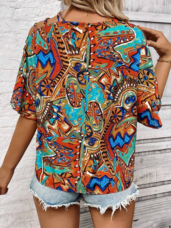 Camisa para mujer de manga murcielago con escote asimetrico y estampado completo para verano