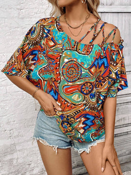 Camisa para mujer de manga murcielago con escote asimetrico y estampado completo para verano