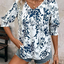 Camisa de media manga suelta con cuello en V y estampado floral para mujer para vacaciones de verano