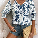 Camisa de media manga suelta con cuello en V y estampado floral para mujer para vacaciones de verano