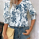 Camisa de media manga suelta con cuello en V y estampado floral para mujer para vacaciones de verano