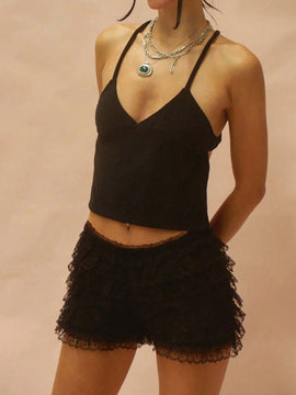 Shorts casuales de mujeres con dobladillo de encaje y parche de patchwork