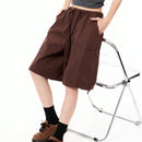 Coolane Pantalones cortos de trabajo holgados y frescos de estilo callejero para mujer con cintura baja, piernas anchas, bolsillos laterales y entrepierna de 5 pulgadas