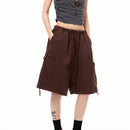 Coolane Pantalones cortos de trabajo holgados y frescos de estilo callejero para mujer con cintura baja, piernas anchas, bolsillos laterales y entrepierna de 5 pulgadas