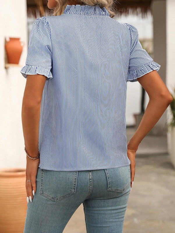 Camisa de mujer con rayas y dobladillo con diseno de hongo