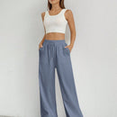 Pantalones sueltos de pierna ancha de color solido para mujer con dobladillo fluido, estilo casual