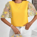Blusa elegante amarilla de manga con volantes y bordados para damas