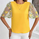 Blusa elegante amarilla de manga con volantes y bordados para damas