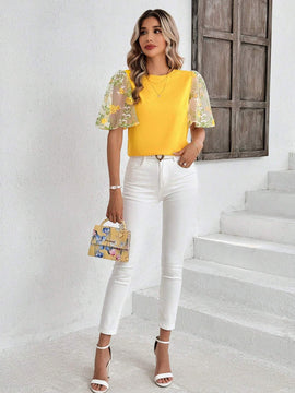 Blusa elegante amarilla de manga con volantes y bordados para damas