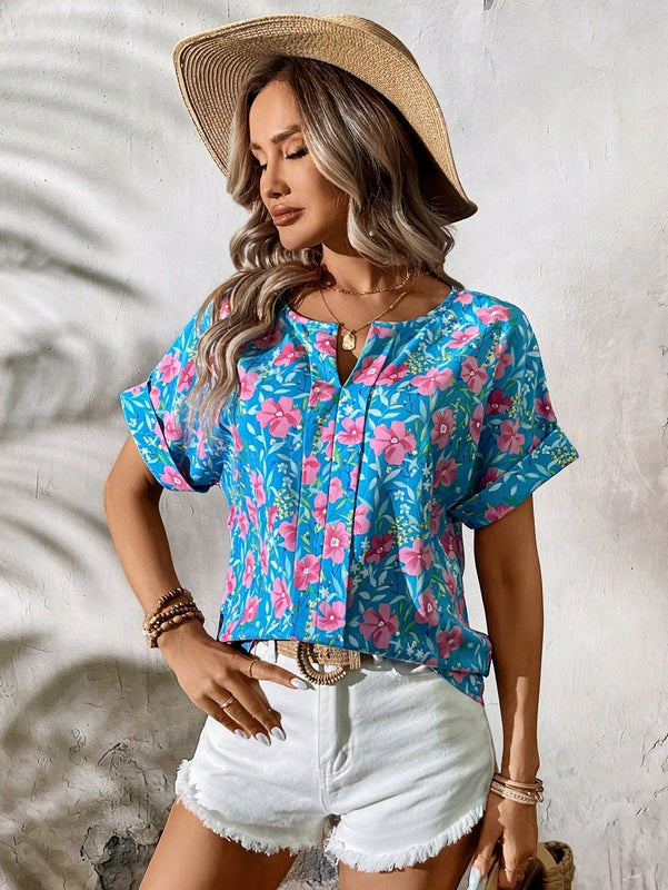 Camiseta de moda casual de verano con estampado floral azul y cuello en V