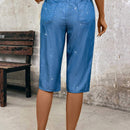 LUNE Pantalones capri plateados recubiertos de imitacion de Jean para mujer