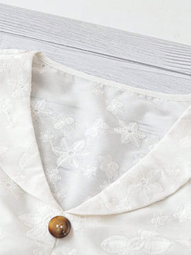 Camisa blanca translucida de manga princesa con cuello en V para mujer con bordados de flores