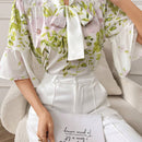 Blusa de verano elegante para mujer con estampado floral y lazo en el cuello