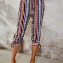 Lune pantalones con diseno geometrico y dobladillo dividido con nudo