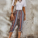 Lune pantalones con diseno geometrico y dobladillo dividido con nudo