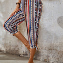 Lune pantalones con diseno geometrico y dobladillo dividido con nudo