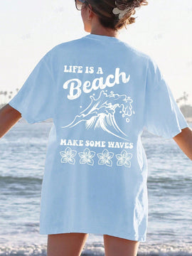 Camiseta etragrande de hombro caido con grafico de ola y lema, camiseta de verano con vibraciones de playa y oceano