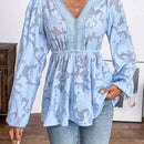 Blusa acampanada con mangas farol y detalles de encaje Jacquard Guipur