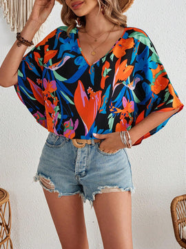 Blusa para mujer tejida suelta con estampado vacacional, cuello en V y mangas murcielago