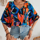 Blusa para mujer tejida suelta con estampado vacacional, cuello en V y mangas murcielago