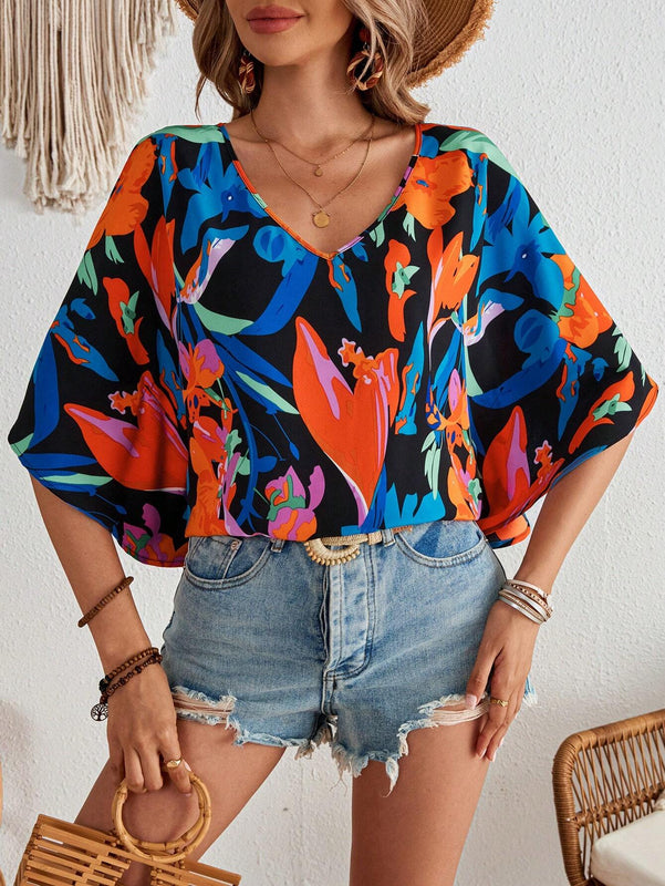 Blusa para mujer tejida suelta con estampado vacacional, cuello en V y mangas murcielago