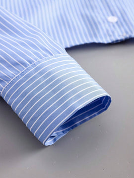 Blusa corta a rayas con detalle de torsion en la espalda