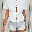 Blusa solida con frente de corbata