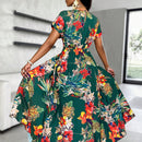 Blusa larga con dobladillo dividido con estampado floral aleatorio