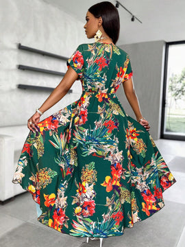 Blusa larga con dobladillo dividido con estampado floral aleatorio
