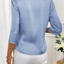 Blusa solida con nudos a los lados en el frente