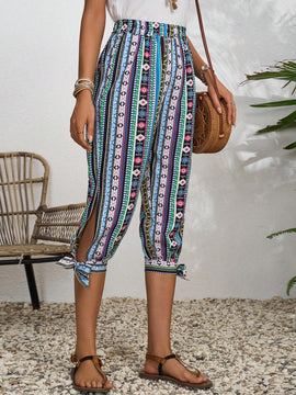 LUNE Pantalones con diseno geometrico y dobladillo dividido con nudo