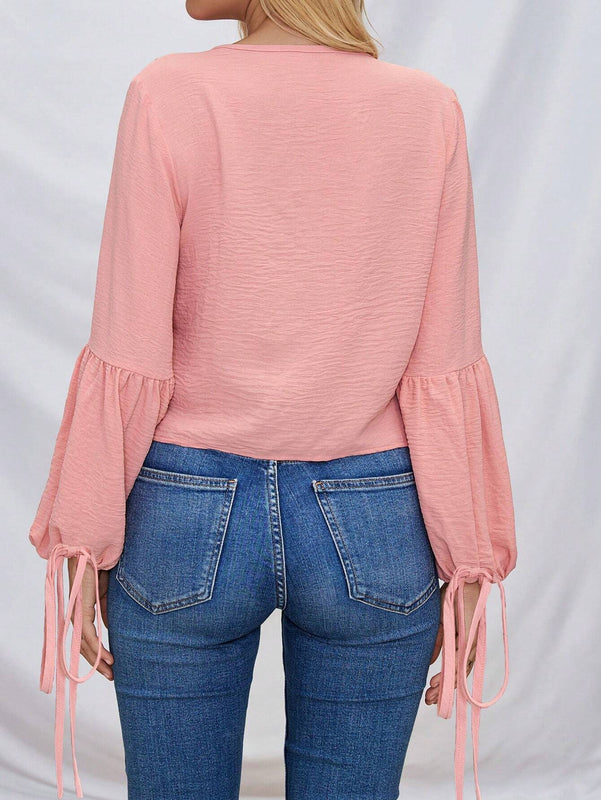 Camisa de manga de farol para mujer con dobladillo de volantes y cinturon de lazo