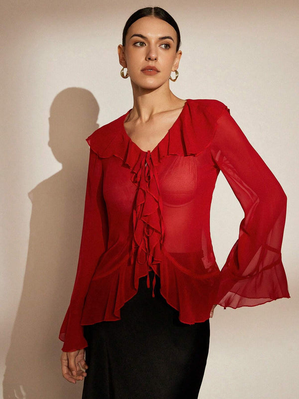 Blusa de gasa transparente de moda para primavera/verano con ribete de volante en las mangas acampanadas