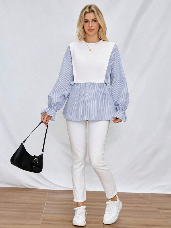 Camisa informal de rayas azules y blancas de mujer para otono/invierno con lazo en la cintura lateral y punos elasticos