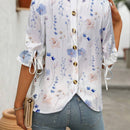 Blusa con estampado floral, botones en la parte posterior, nudo en los punos