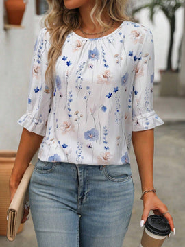 Blusa con estampado floral, botones en la parte posterior, nudo en los punos