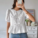 Frenchy Blusa acampanada con nudo delantero y estampado de rayas