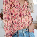 Blusa con estampado floral con cuello de lazo y mangas con vuelo