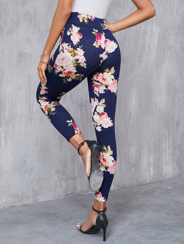 Clasi Pantalones largos elegantes Slim con decoracion de boton falso y estampado floral para mujeres